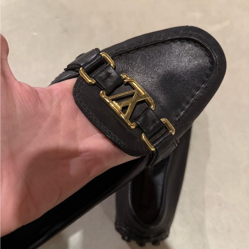 Louis Vuitton Black Loafers with Gold Logo